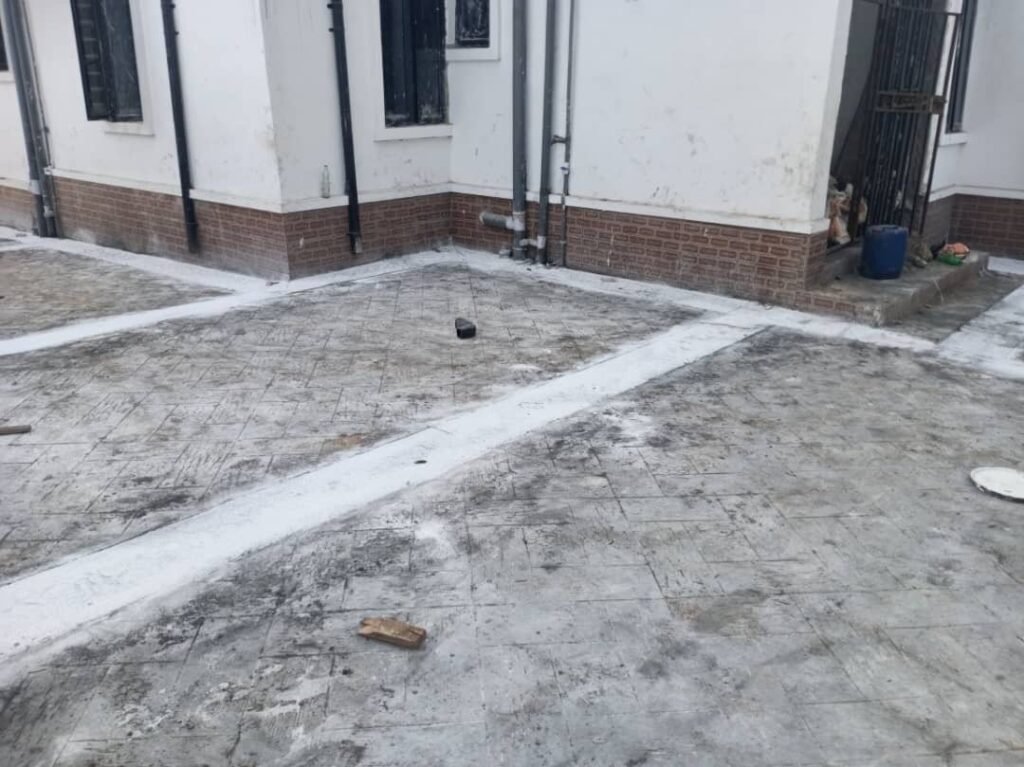 Patterned compound floor tiling project in Enugu